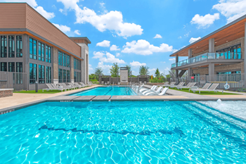 Resort-style pool with cabanas